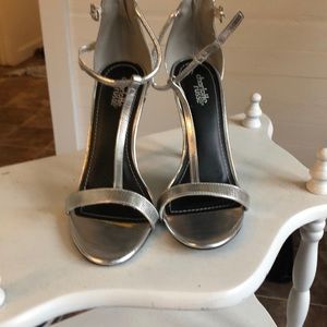 Silver heels never worn